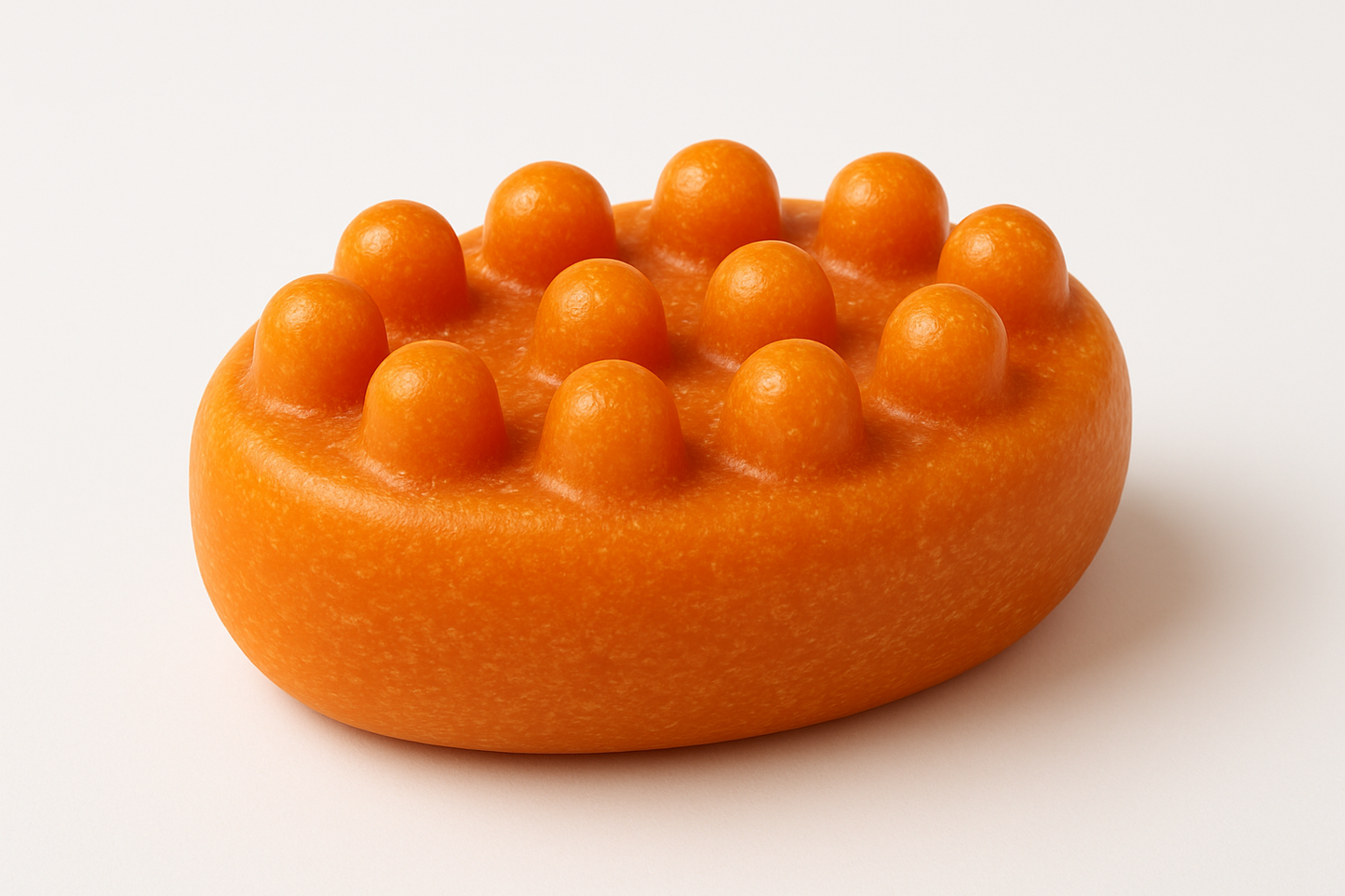 orange color oval knobby massage bar soap